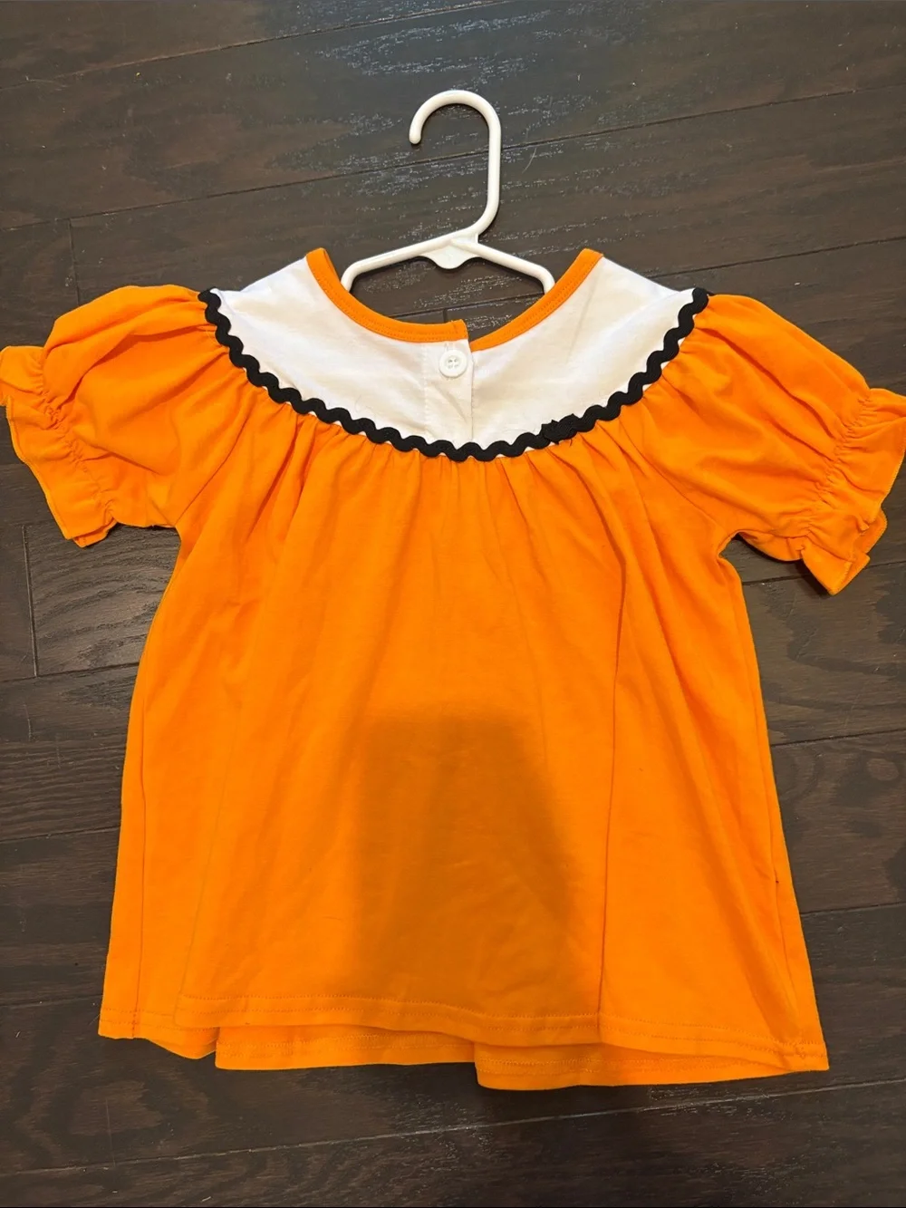 Girls Orange Pumpkin & Spider Ruffle Top with Orange/Black Striped Flare Bottoms